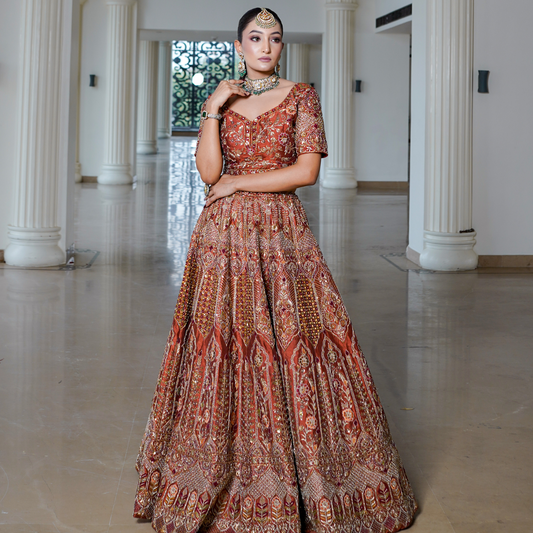 Rust Raw Silk Lehenga with Intricate Hand Embroidery