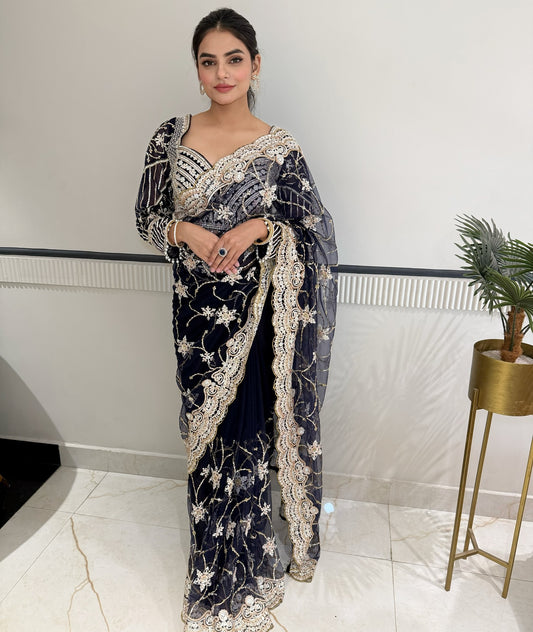 Midnight Elegance: Hand-Embellished Blue Sari with Stitched Blouse
