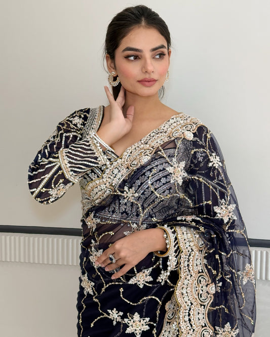 Midnight Elegance: Hand-Embellished Blue Sari with Stitched Blouse