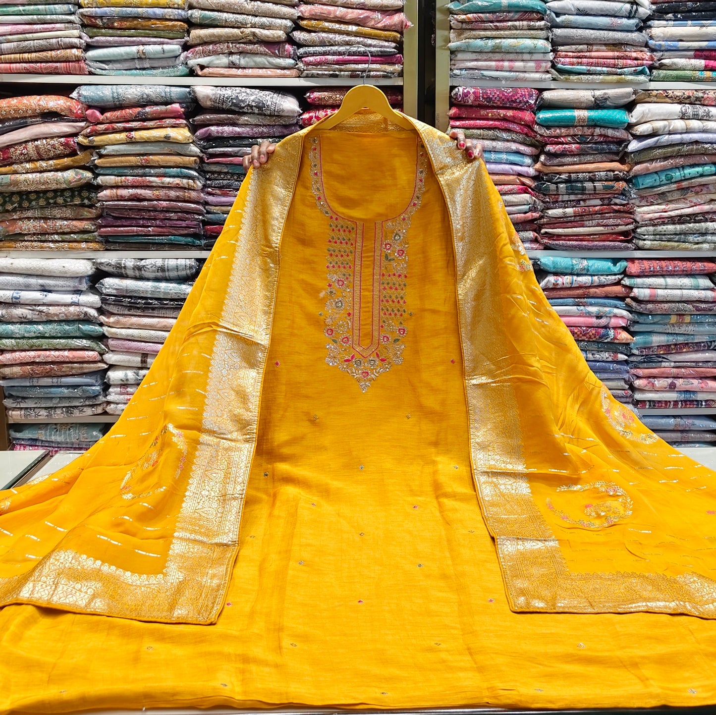 Mustard dola silk suit
Zari resham sequins suit set
Organza dupatta suit design
Festive unstitched suit for women
Designer ethnic wear mustard suit