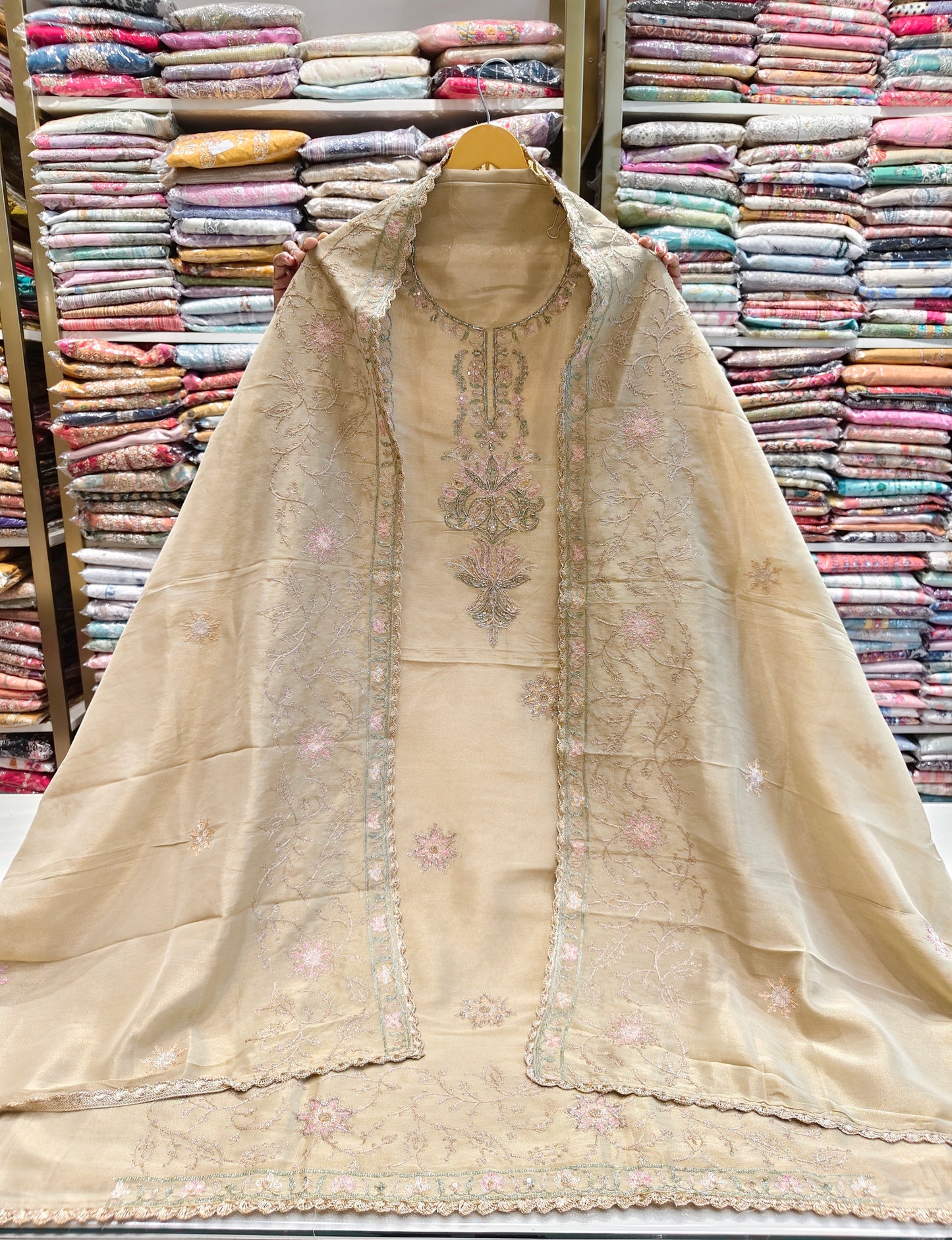 Golden tissue suit set
Katdana sequins ethnic wear
Resham zari festive suit
Designer unstitched party wear suit
Tissue dupatta wedding outfit
