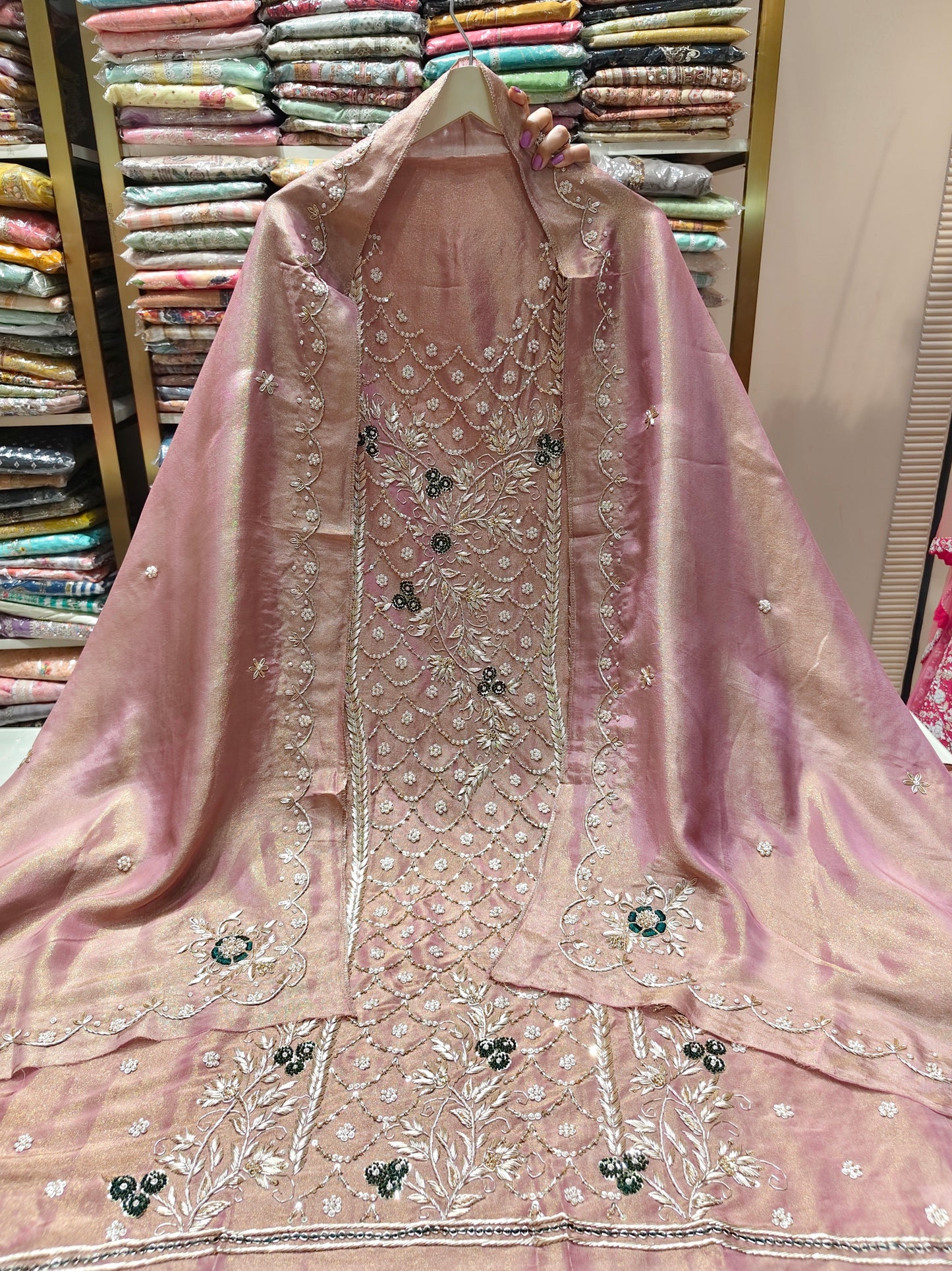 Rose Gold Unstitched Suit
Tissue Suit Set
Dabka Work Suit
Sequins Work Suit
Designer Festive Suit