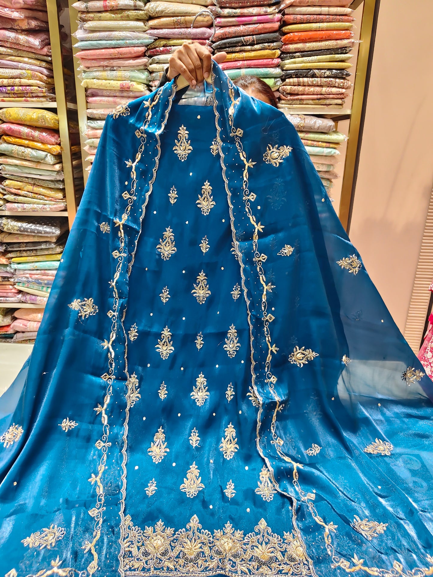 Teal Blue Unstitched Suit
Jimmy Choo Suit Set
Kutdana Work Suit
Dabka Work Suit
Designer Festive Suit