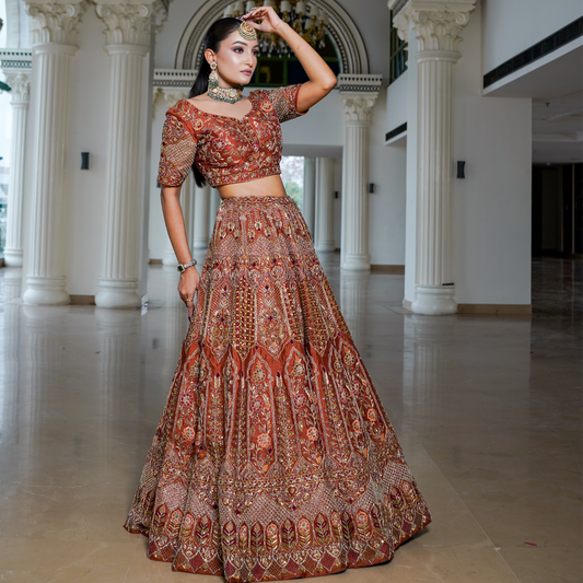Rust Raw Silk Lehenga with Intricate Hand Embroidery