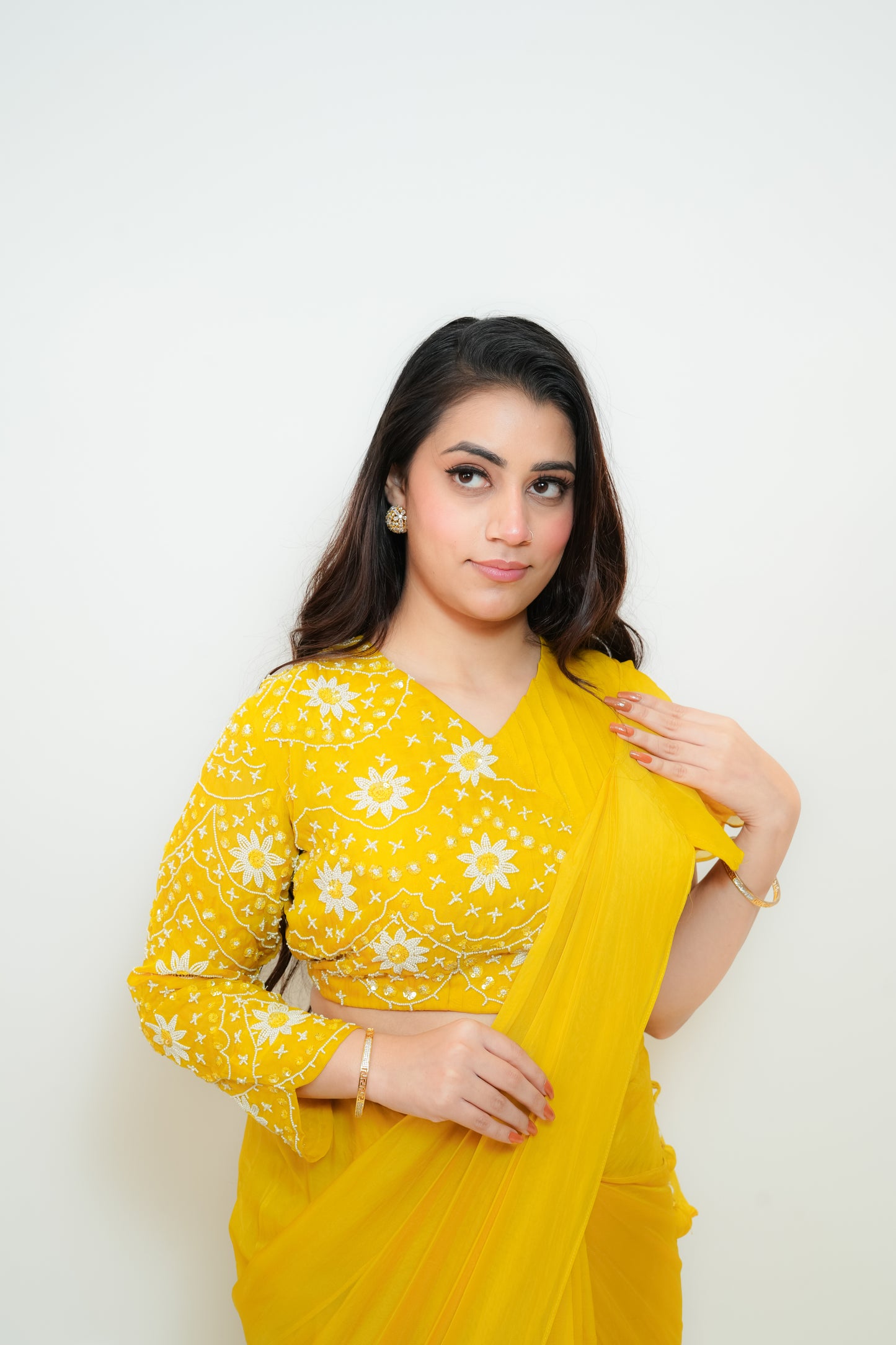 Bright yellow drape saree