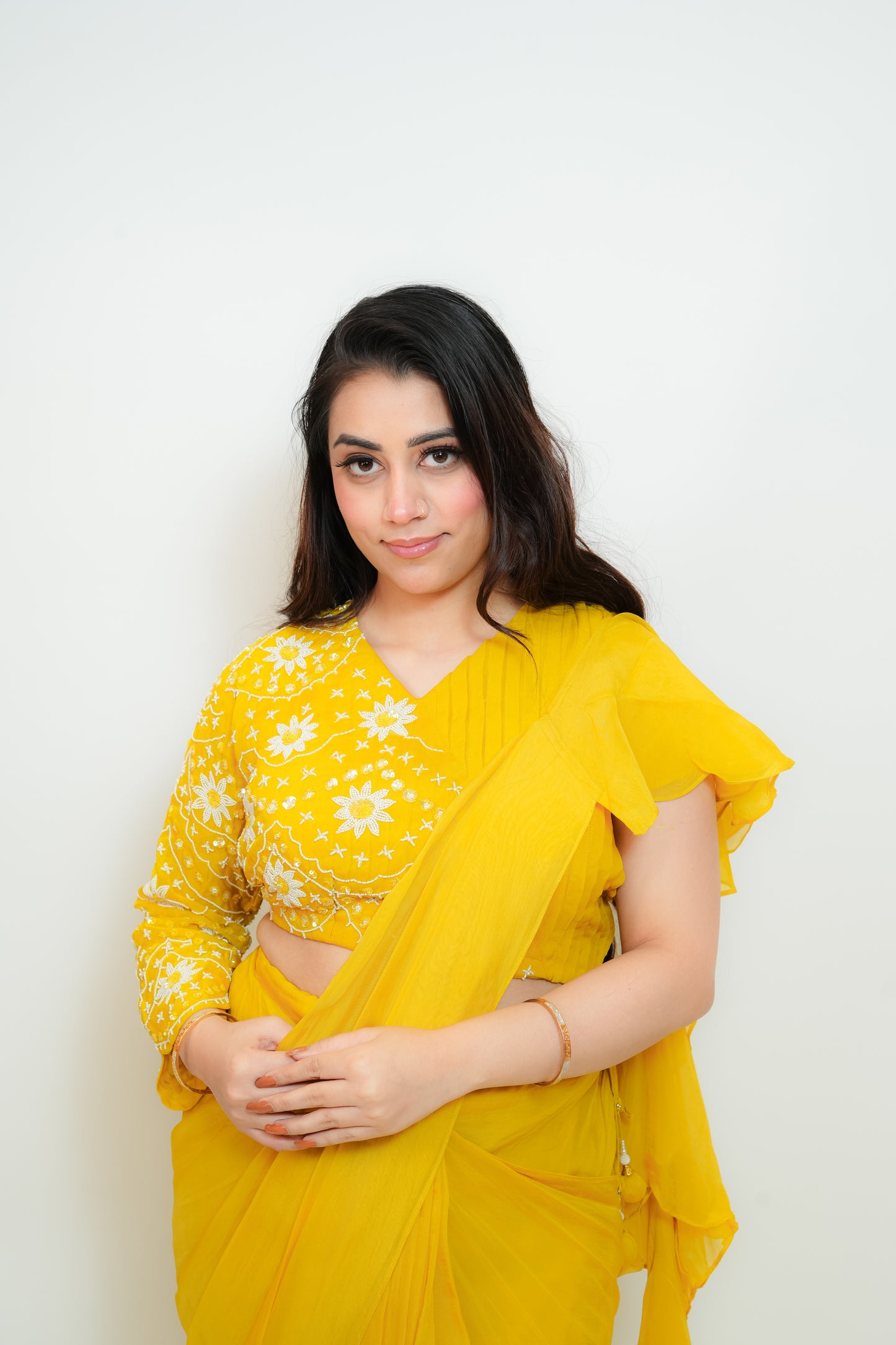 Bright yellow drape saree