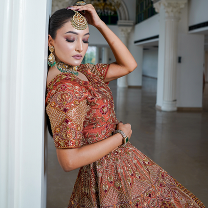 Rust Raw Silk Lehenga with Intricate Hand Embroidery
