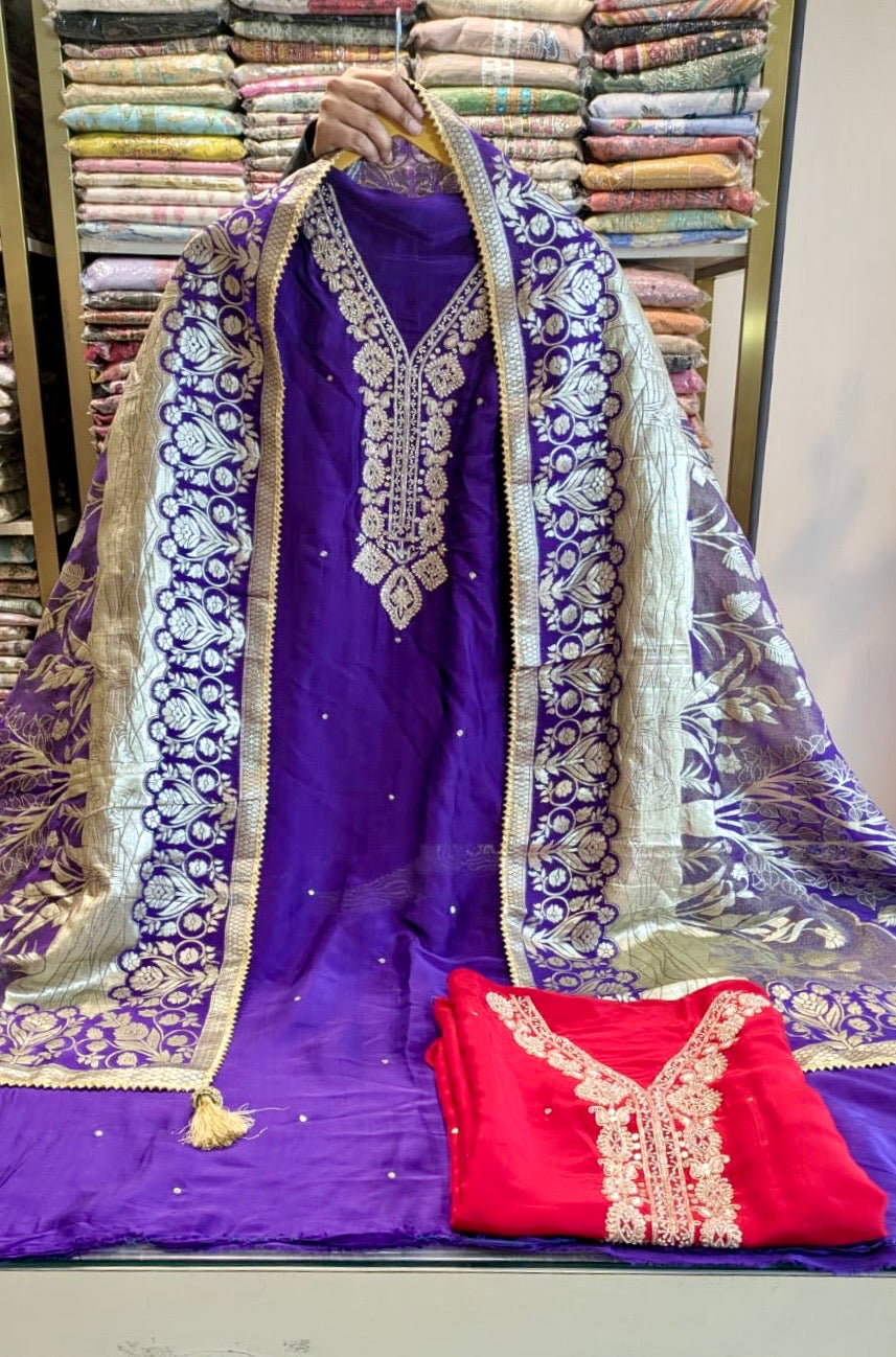 • Premium Upara Silk suit with handwork neck design and Khaddi dupatta
• Elegant unstitched festive wear perfect for weddings and parties
• Designer Upara Silk dress material with highlighted neckline
• Stylish ethnic wear for women for festive and traditional occasions
• Luxury party wear suit with Upara Silk bottom and Khaddi dupatta