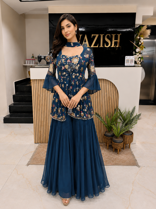 Blue Indo Western Gharara Set
Designer Peplum Gharara Outfit
Georgette Indo Western Dress
Wedding Wear Gharara for Women
Contemporary Festive Wear India