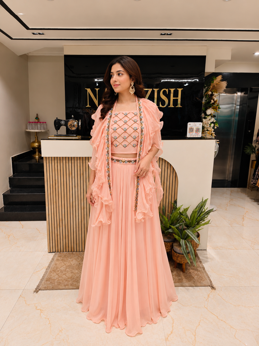 Peach Indo Western Palazzo Set
Ruffle Dupatta Palazzo Outfit
Designer Fusion Wear for Women
Resham Kutdana Work Set
Modern Festive Wear India