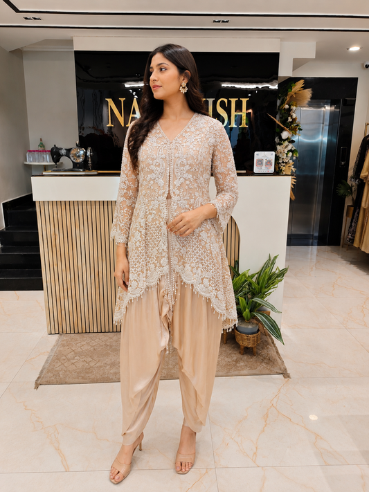 Cream Indo Western Set
Designer Tulip Pant Outfit
Resham Sequins Handwork Set
Luxury Fusion Wear for Women
Elegant Party Wear Outfit