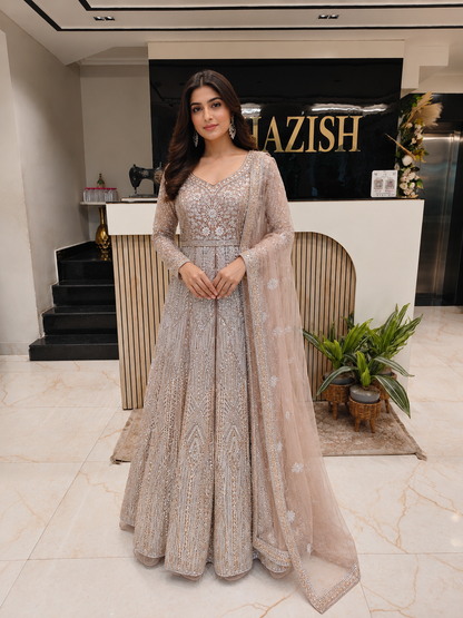 Mouse Grey Designer Anarkali
Net Anarkali with Zari Work
Stone Work Festive Anarkali
Luxury Wedding Wear India
Elegant Party Wear Anarkali