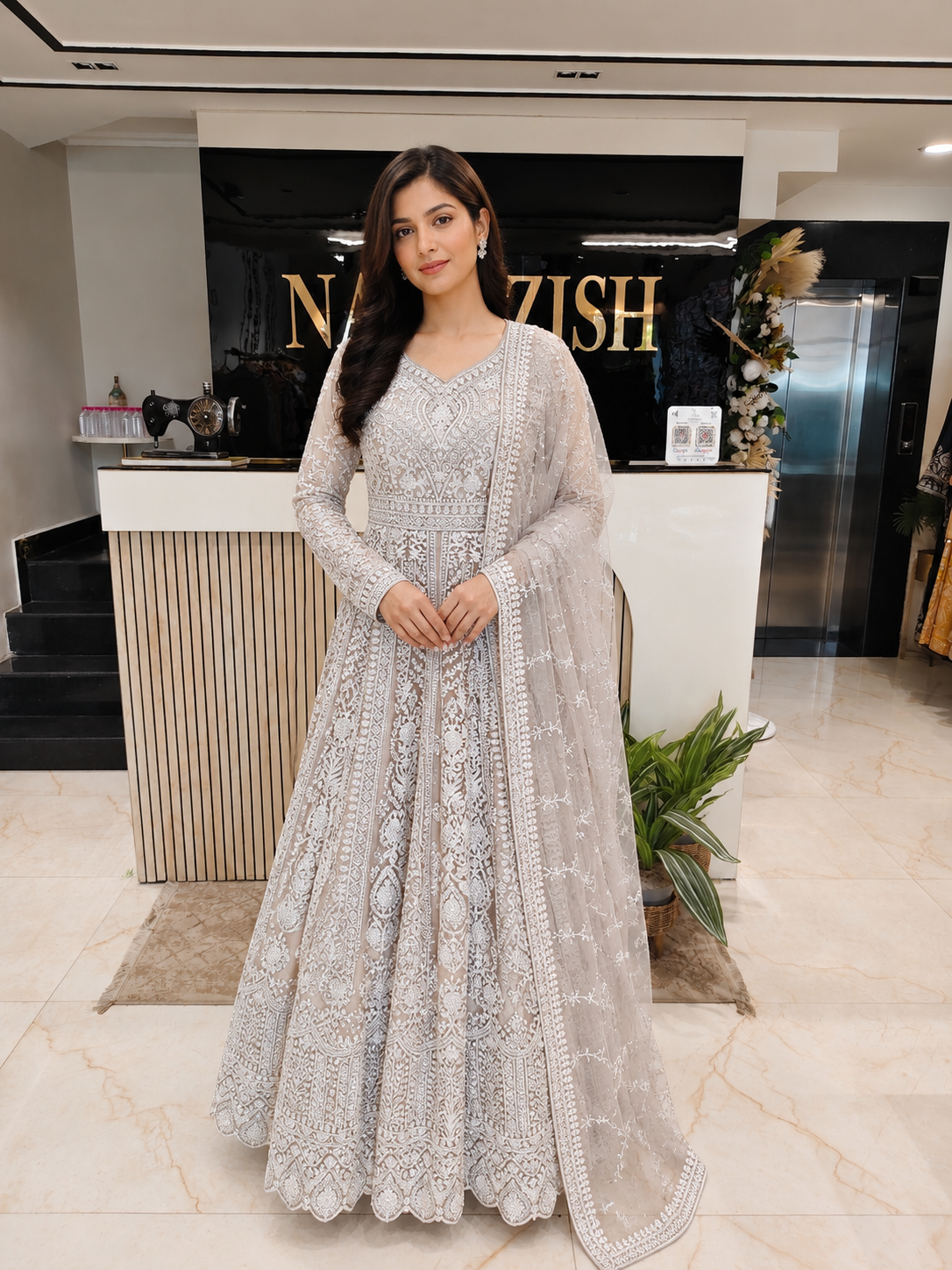 Beige Designer Anarkali Set
Peplum Style Festive Wear
Dori Stone Work Outfit
Wedding Wear Anarkali India
Luxury Party Wear for Women