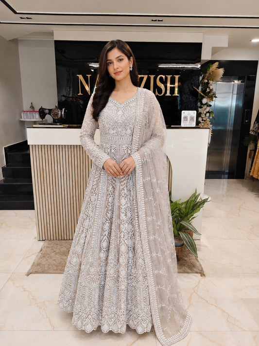Beige Designer Anarkali Set
Peplum Style Festive Wear
Dori Stone Work Outfit
Wedding Wear Anarkali India
Luxury Party Wear for Women