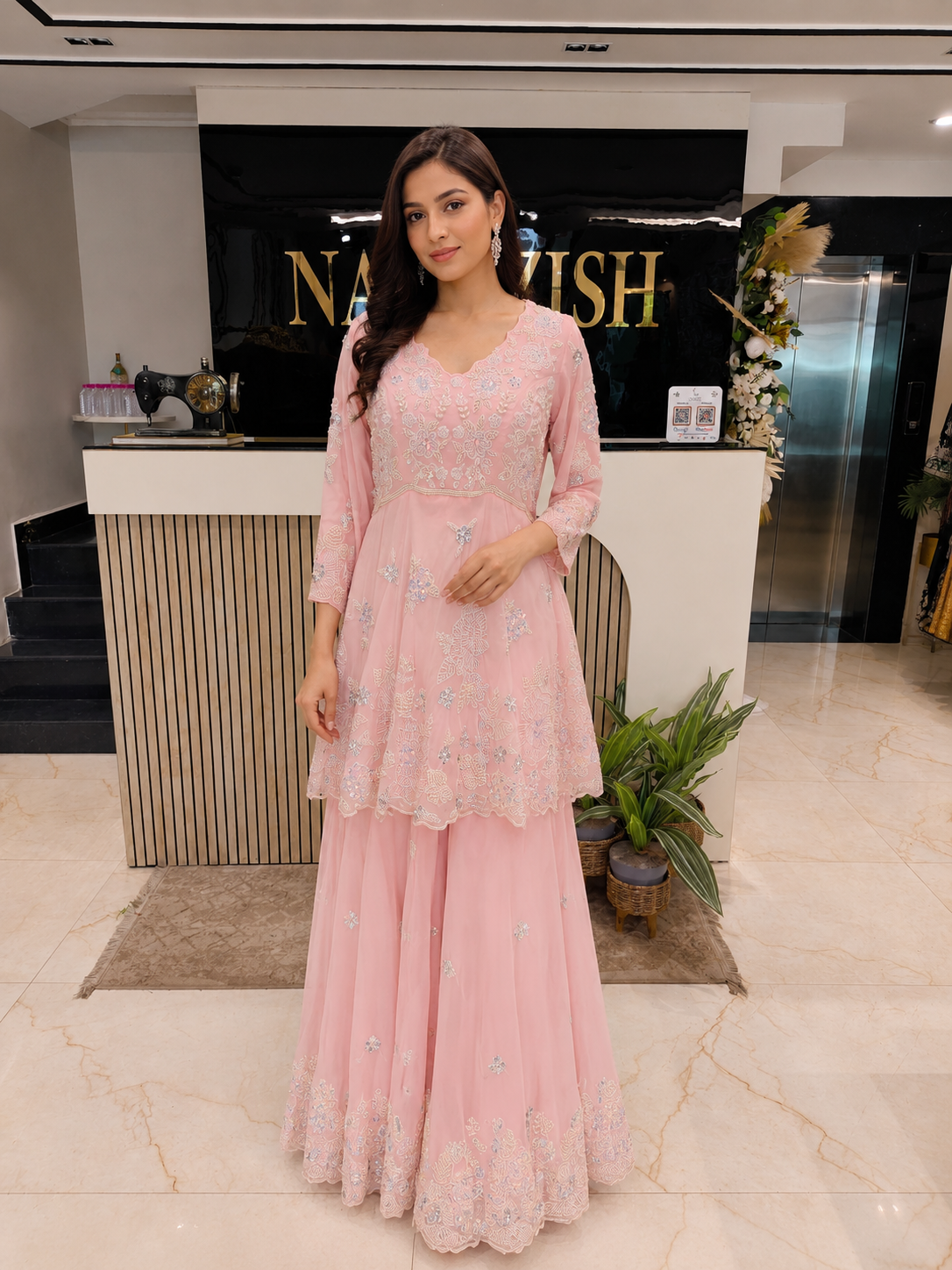 Baby Pink Sharara Set
Indo Western Festive Wear
Designer Peplum Outfit India
Resham Work Party Wear
Fusion Wedding Wear Women