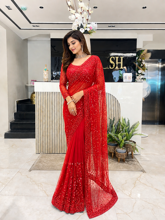 Red net saree with sequins work
Bridal zarkan katdana saree red
Designer net saree with pull hanging
Heavy work party wear red saree
Wedding wear red embroidered saree