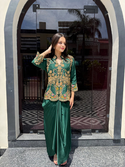 Crafted for statement dressing, this green co-ord set features a hand-embellished shirt with detailed threadwork and a flowing crêpe drape skirt—perfect for modern occasions.