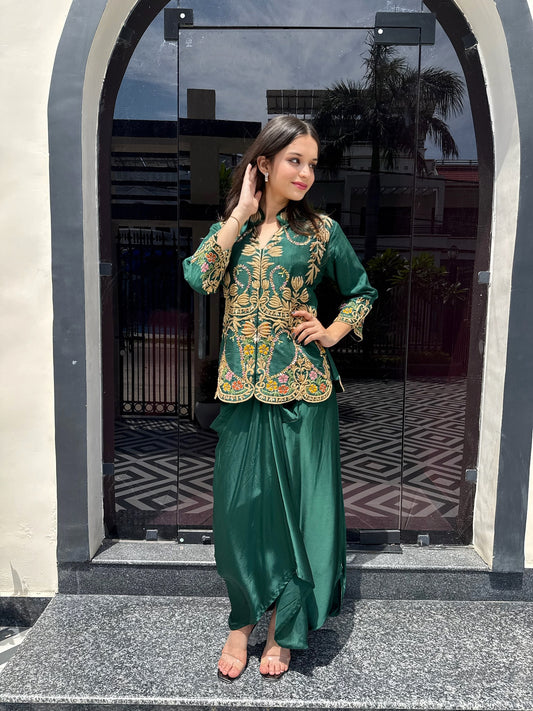 This green Western co-ord blends craftsmanship and comfort, with a meticulously hand-worked shirt and a soft crêpe draped skirt that moves beautifully with every step.