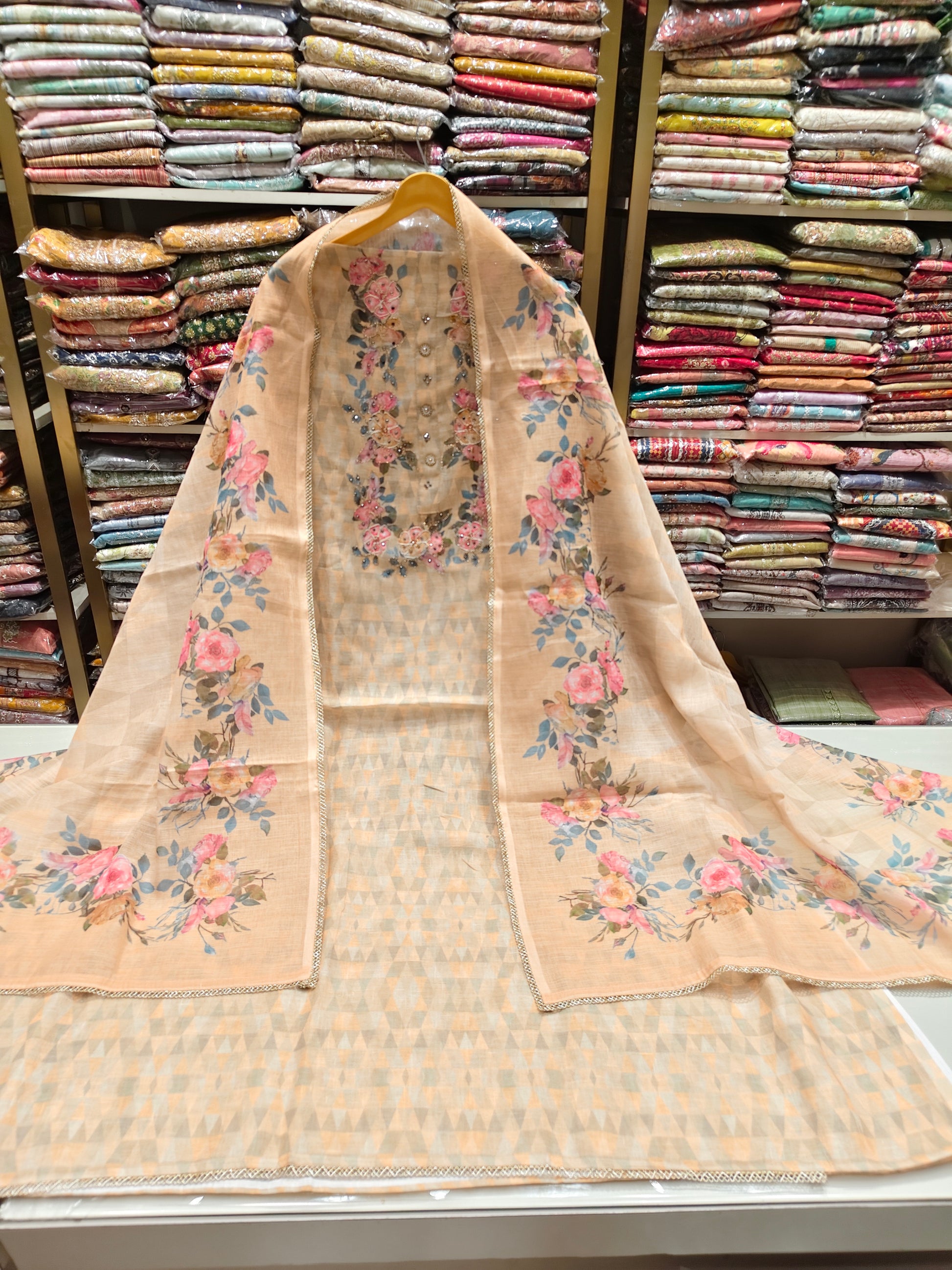 Peach Linen Unstitched Suit
Flower Print Linen Suit Set
Dori Work Designer Suit
Stone Work Linen Dress Material
Peach Floral Dupatta Suit