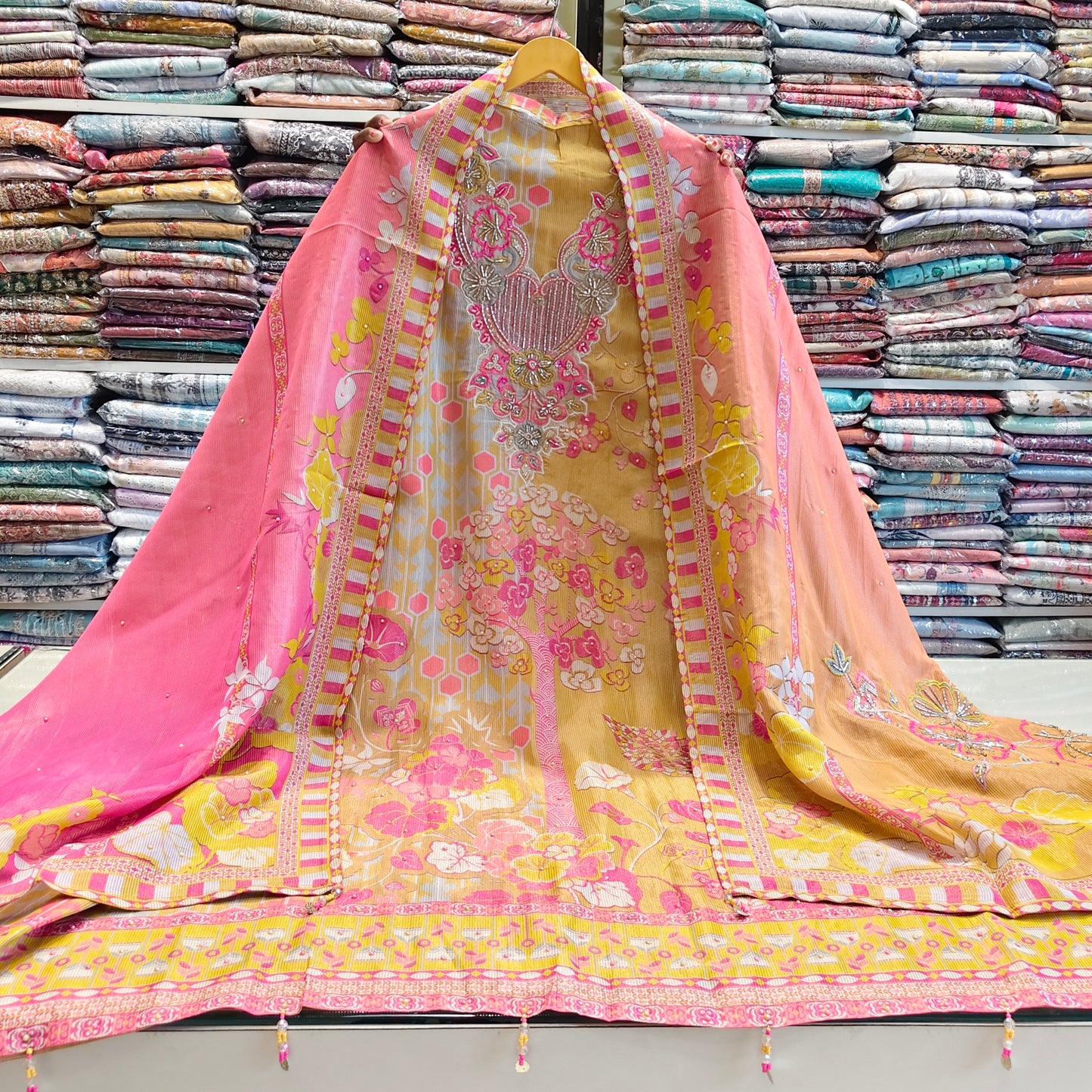 Lemon tissue kutdana suit
Floral dupatta ethnic suit
Designer unstitched festive wear
Tissue silk suit for women
Sequins work lemon suit