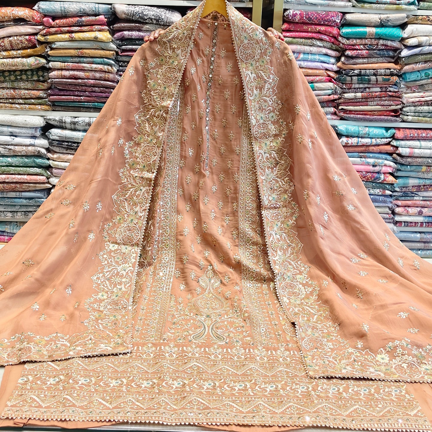 Gold Organza Unstitched Suit
Sequin Zari Work Suit
Designer Organza Dress Material
Organza Suit with Silk Bottom
Ethnic Suit India