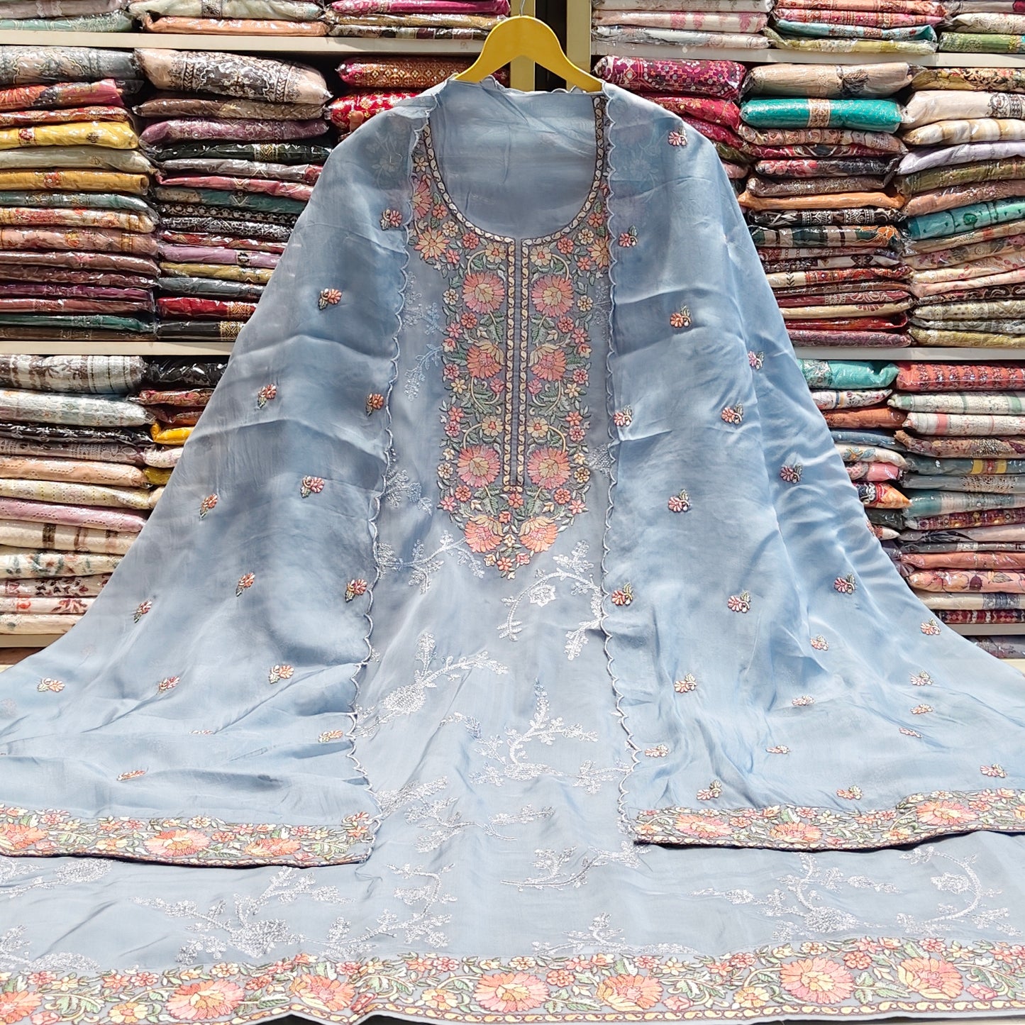Powder blue organza suit
Resham work organza suit set
Designer pastel ethnic wear
Organza dupatta suit for women
Elegant unstitched festive suit