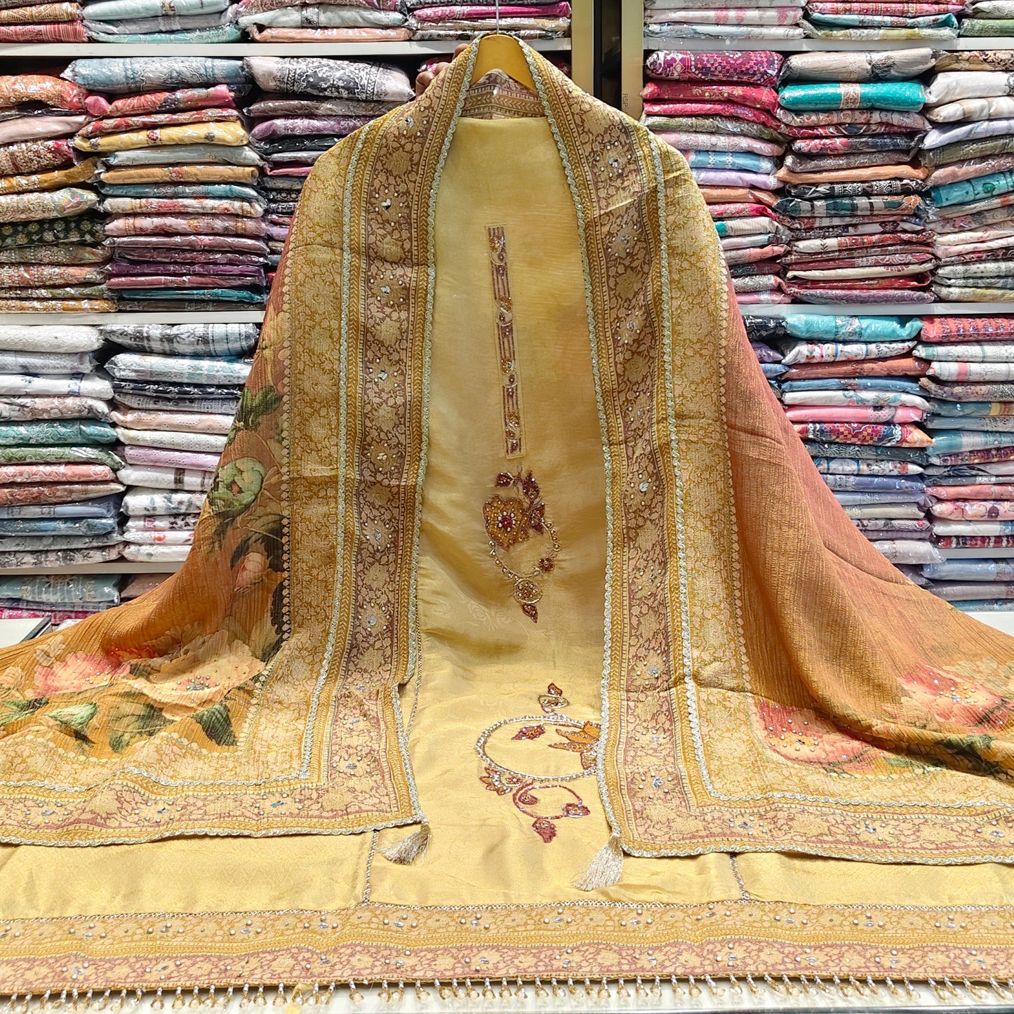 Gold tissue dabka kutdana suit
Heavy work wedding suit set
Designer unstitched gold suit
Crush tissue dupatta ethnic wear
Festive zari resham suit for women