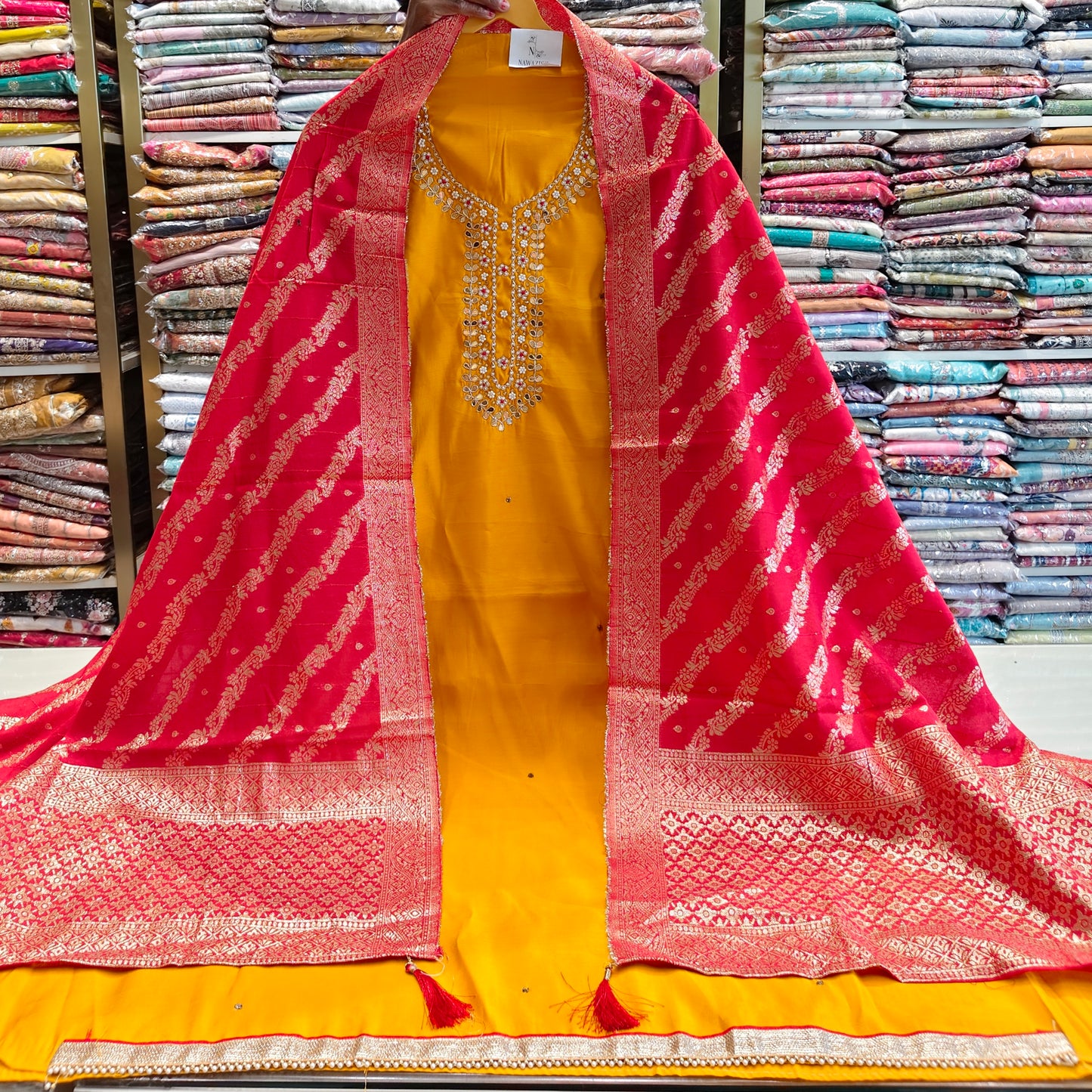 Mustard cotton suit set
Dabka work unstitched suit
Resham zari ethnic wear
Tissue dupatta festive suit
Designer cotton traditional suit