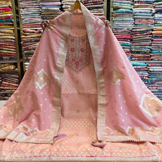 Rose gold tissue suit
Dabka kutdana work suit
Designer festive ethnic wear
Chiffon dupatta zari suit
Party wear unstitched suit set