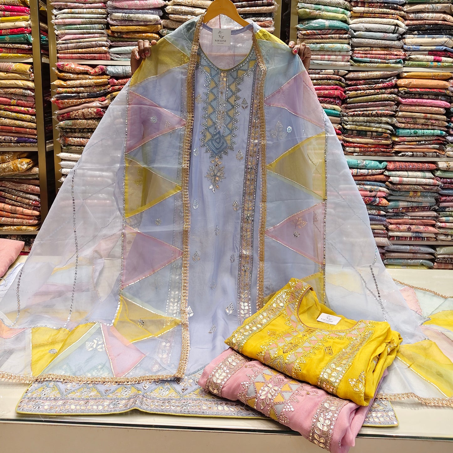 Organza patch work suit
Dori work unstitched suit
Multi colour dupatta suit set
Designer festive ethnic wear
Elegant organza party wear suit