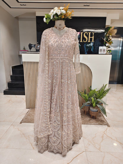 Peach Designer Anarkali
Net Anarkali with Kutdana Work
Scallop Dupatta Anarkali Suit
Luxury Festive Wear for Women
Elegant Wedding Wear India