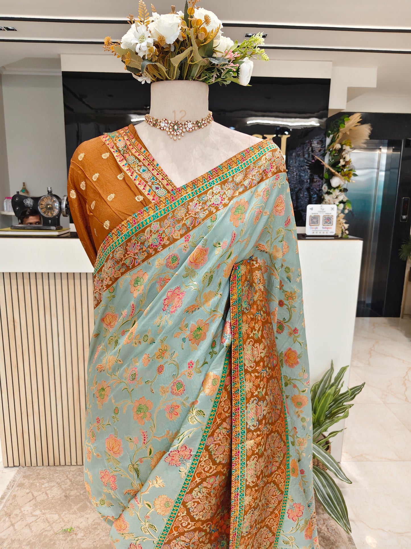 Rust & Sea Green Modal Crepe Saree