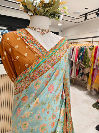 Rust & Sea Green Modal Crepe Saree