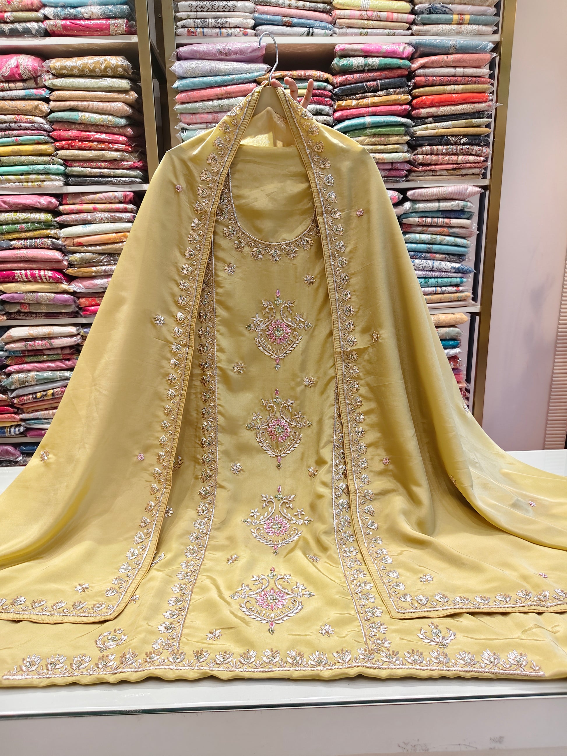 Olive Gold Unstitched Suit
Crepe Suit Set
Dabka Work Suit
Designer Festive Suit
Wedding Wear Unstitched Suit