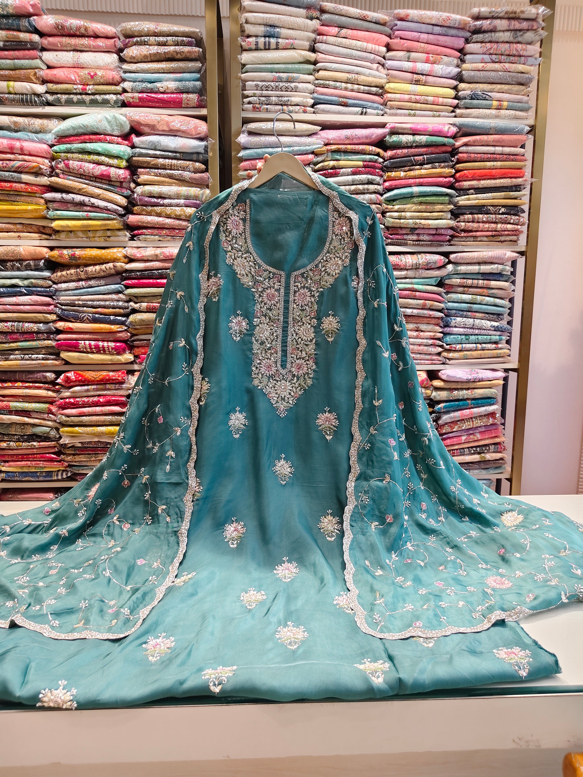 Rama Green Unstitched Suit
Organza Suit Set
Dabka Work Suit
Gota Patti Suit
Designer Festive Suit