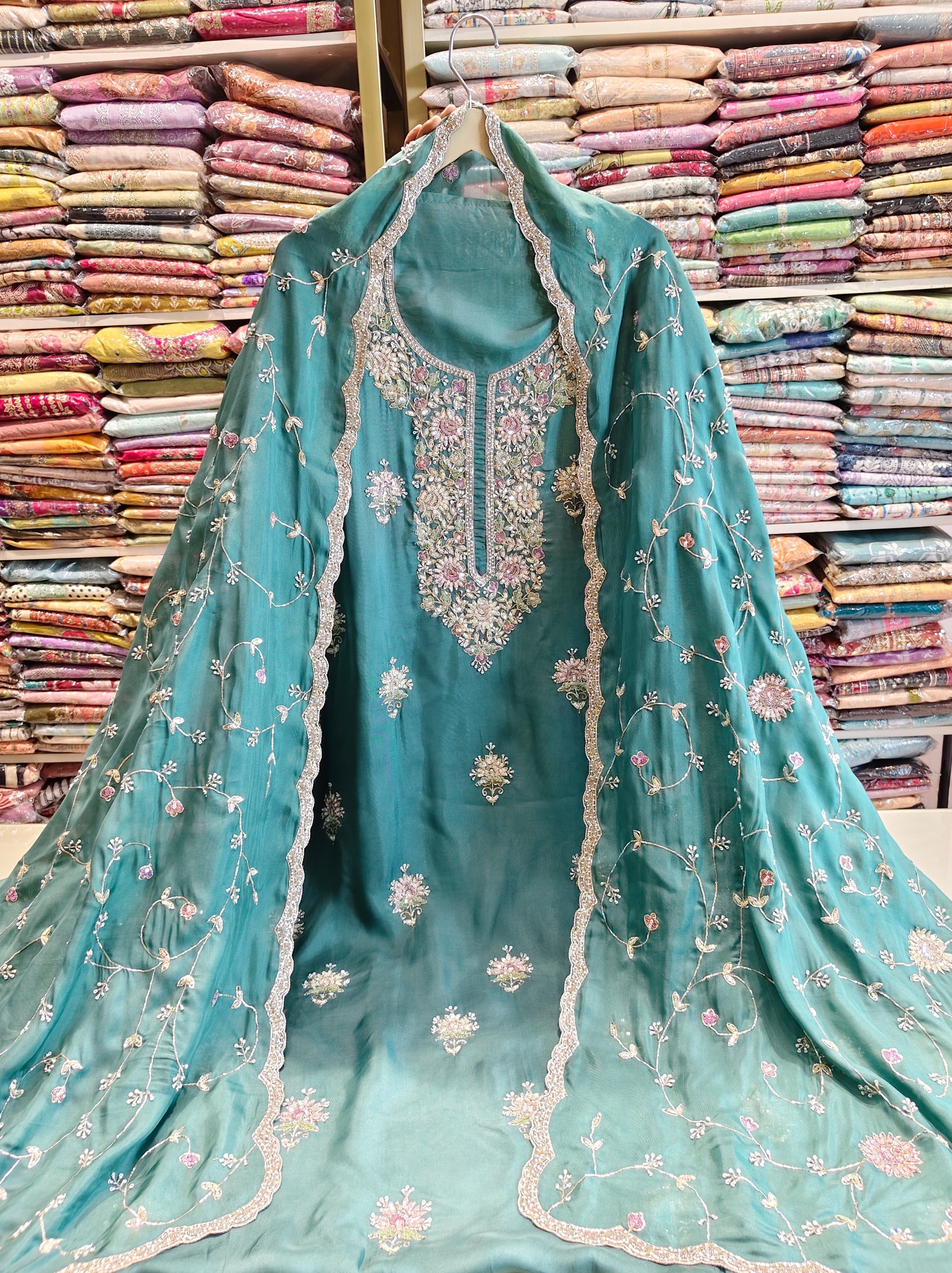 Rama Green Unstitched Suit
Organza Suit Set
Dabka Work Suit
Resham Work Suit
Designer Festive Suit