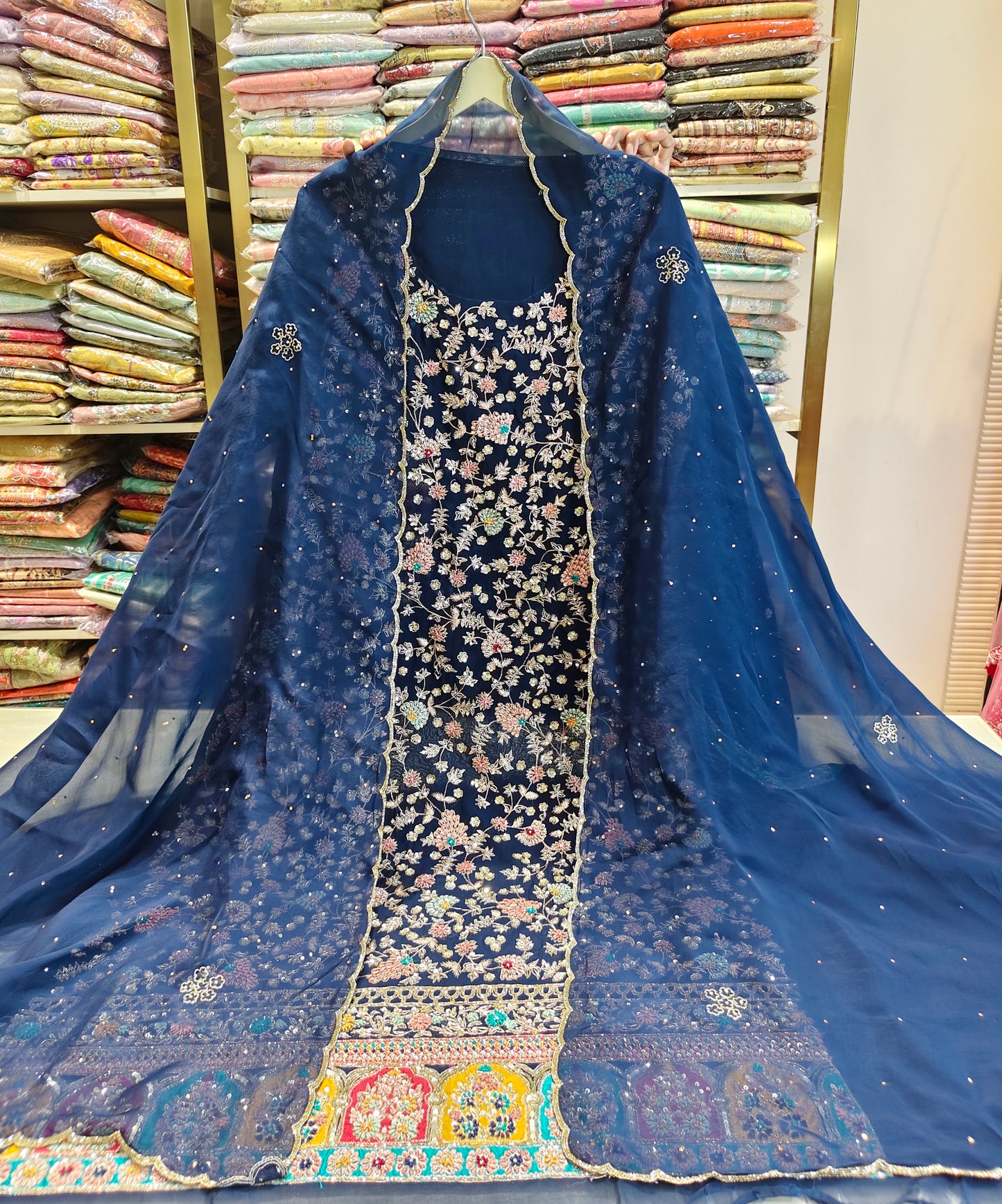 Navy Blue Unstitched Suit
Organza Suit Set
Dabka Work Suit
Patch Work Suit
Designer Festive Suit
