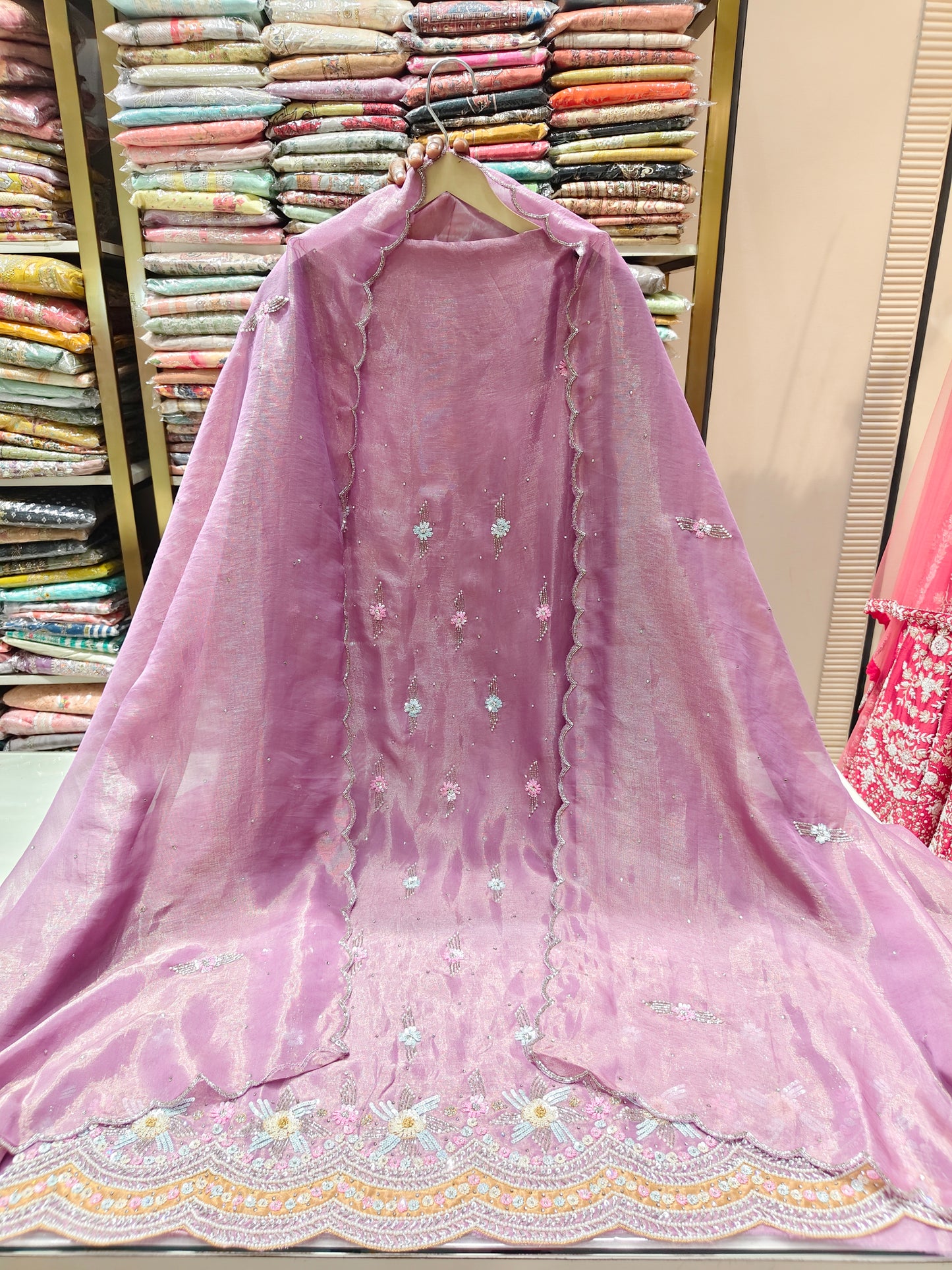 Lavender Unstitched Suit
Tissue Suit Set
Kutdana Work Suit
Stone Work Suit
Designer Festive Suit