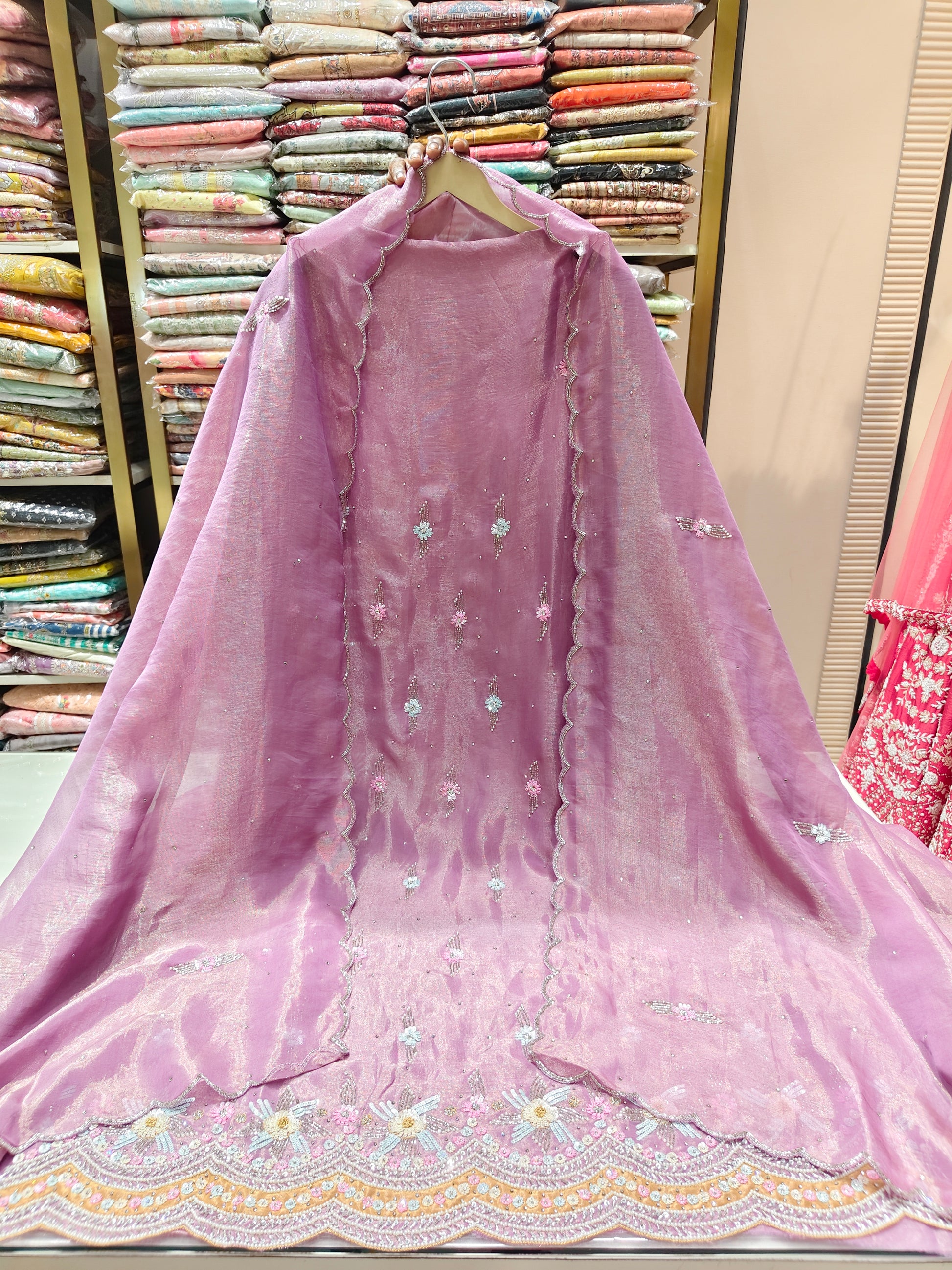 Lavender Unstitched Suit
Tissue Suit Set
Kutdana Work Suit
Stone Work Suit
Designer Festive Suit