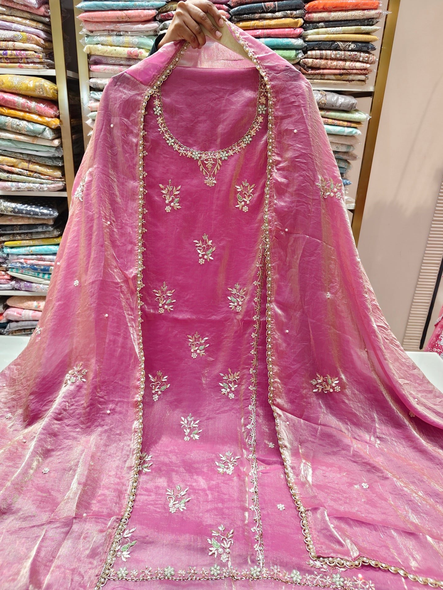 Rani Pink Unstitched Suit
Glass Tissue Suit Set
Dabka Work Suit
Sequins Work Suit
Designer Festive Suit