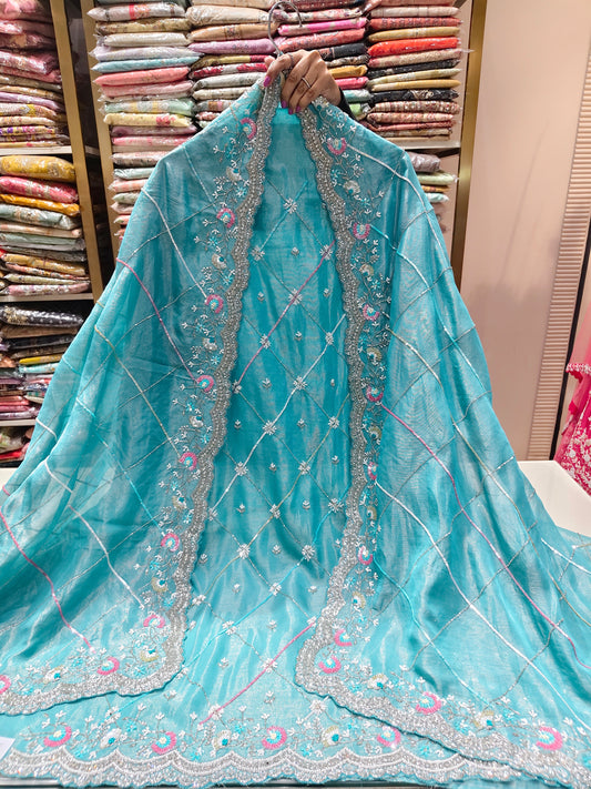 Aqua Blue Unstitched Suit
Tissue Suit Set
Multicolour Sequins Suit
Kutdana Work Suit
Designer Festive Suit