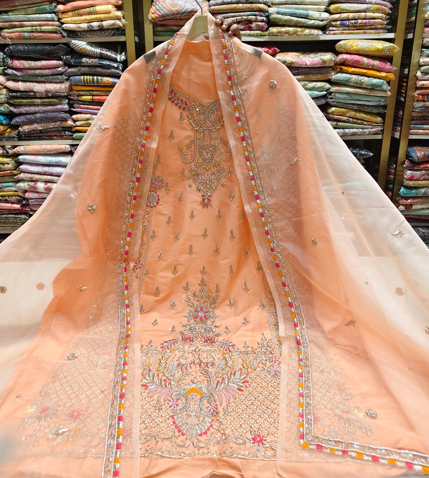 Peach Unstitched Suit
Silk Suit Set
Dabka Work Suit
Resham Work Suit
Designer Festive Suit