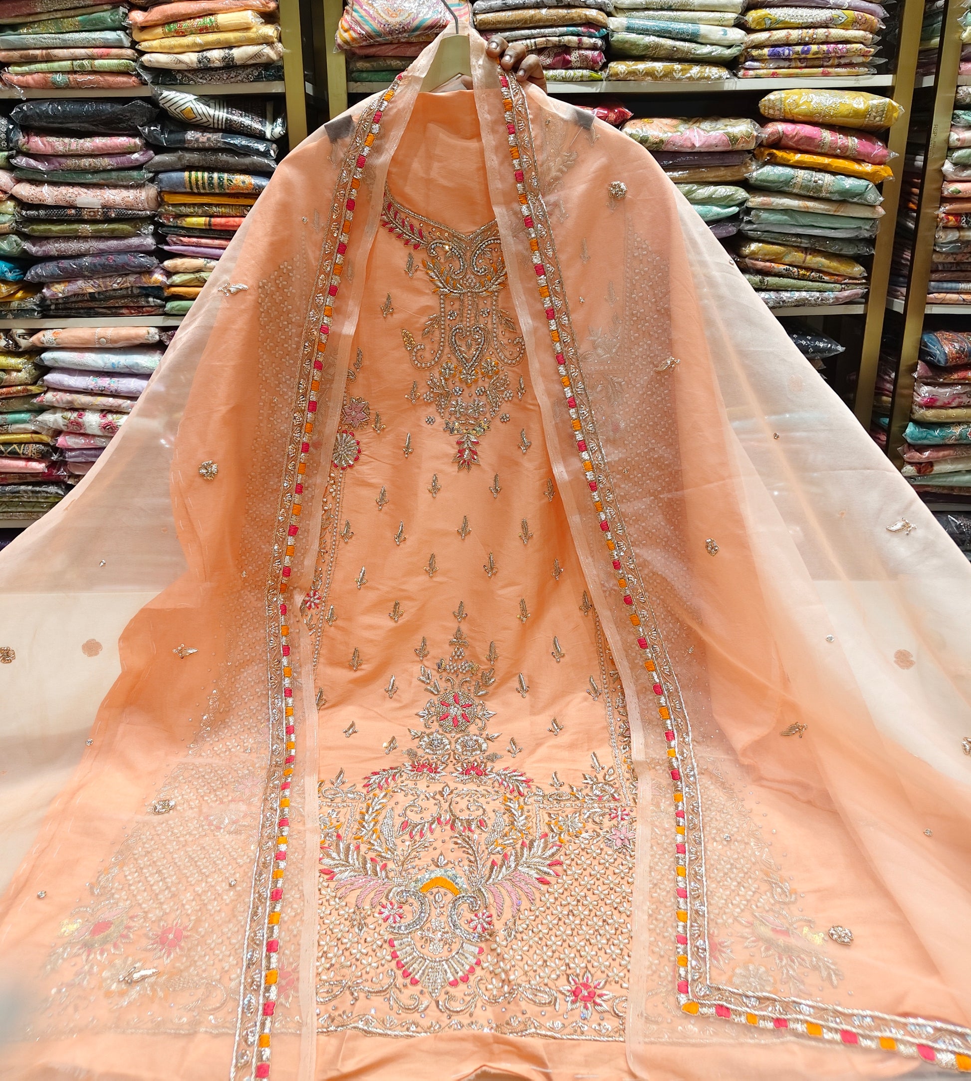 Peach Unstitched Suit
Silk Suit Set
Dabka Work Suit
Resham Work Suit
Designer Festive Suit