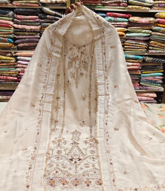Beige Unstitched Suit
Tissue Suit Set
Kutdana Work Suit
Dabka Work Suit
Designer Festive Suit