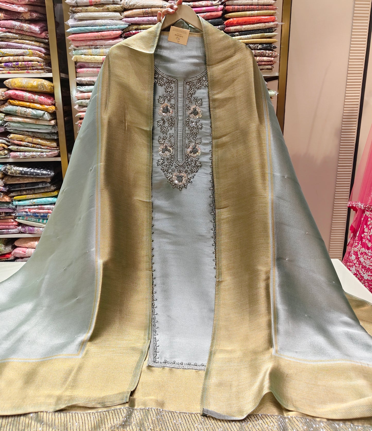 Grey Gold Unstitched Suit
Tissue Suit Set
Kutdana Work Suit
Crystal Hanging Suit
Designer Festive Suit