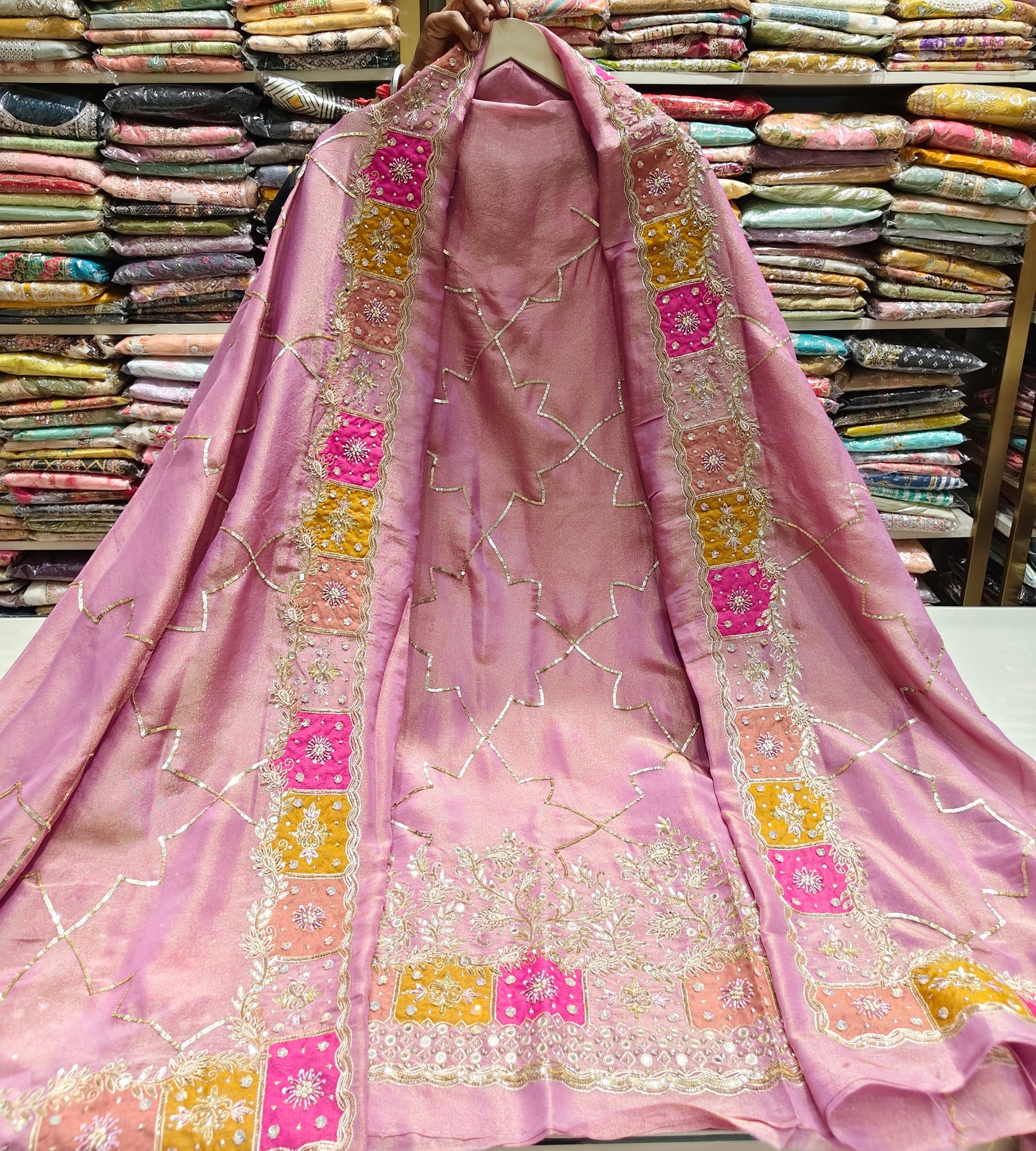 Lavender Unstitched Suit
Tissue Suit Set
Mirror Work Suit
Dabka Work Suit
Designer Festive Suit