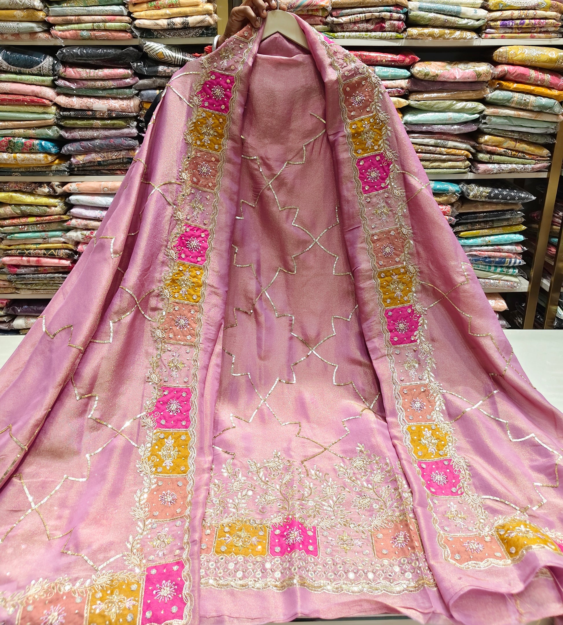 Lavender Unstitched Suit
Tissue Suit Set
Mirror Work Suit
Dabka Work Suit
Designer Festive Suit