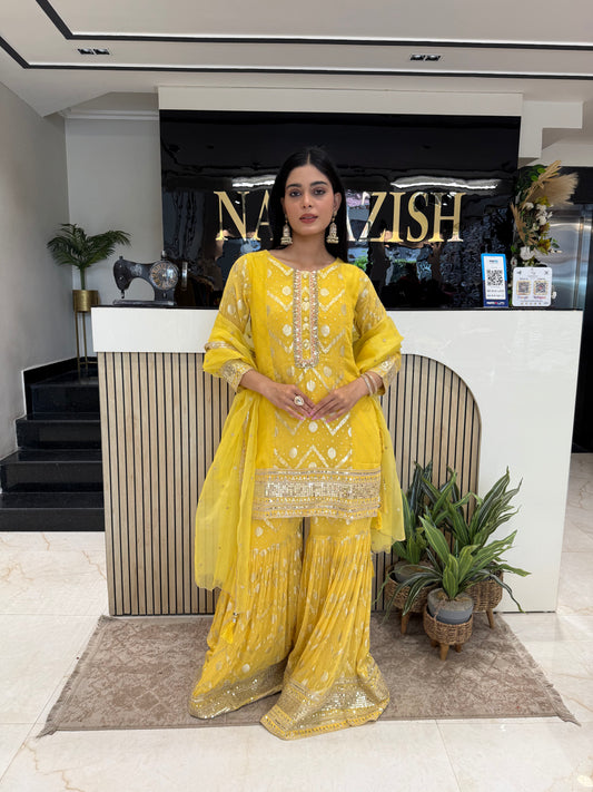 Yellow Khaddi Georgette Garara Suit
Designer Garara Suit with Zari Work
Party Wear Yellow Garara Dress
Wedding Wear Garara Suit with Organza Dupatta
Sequence Resham Work Garara Suit