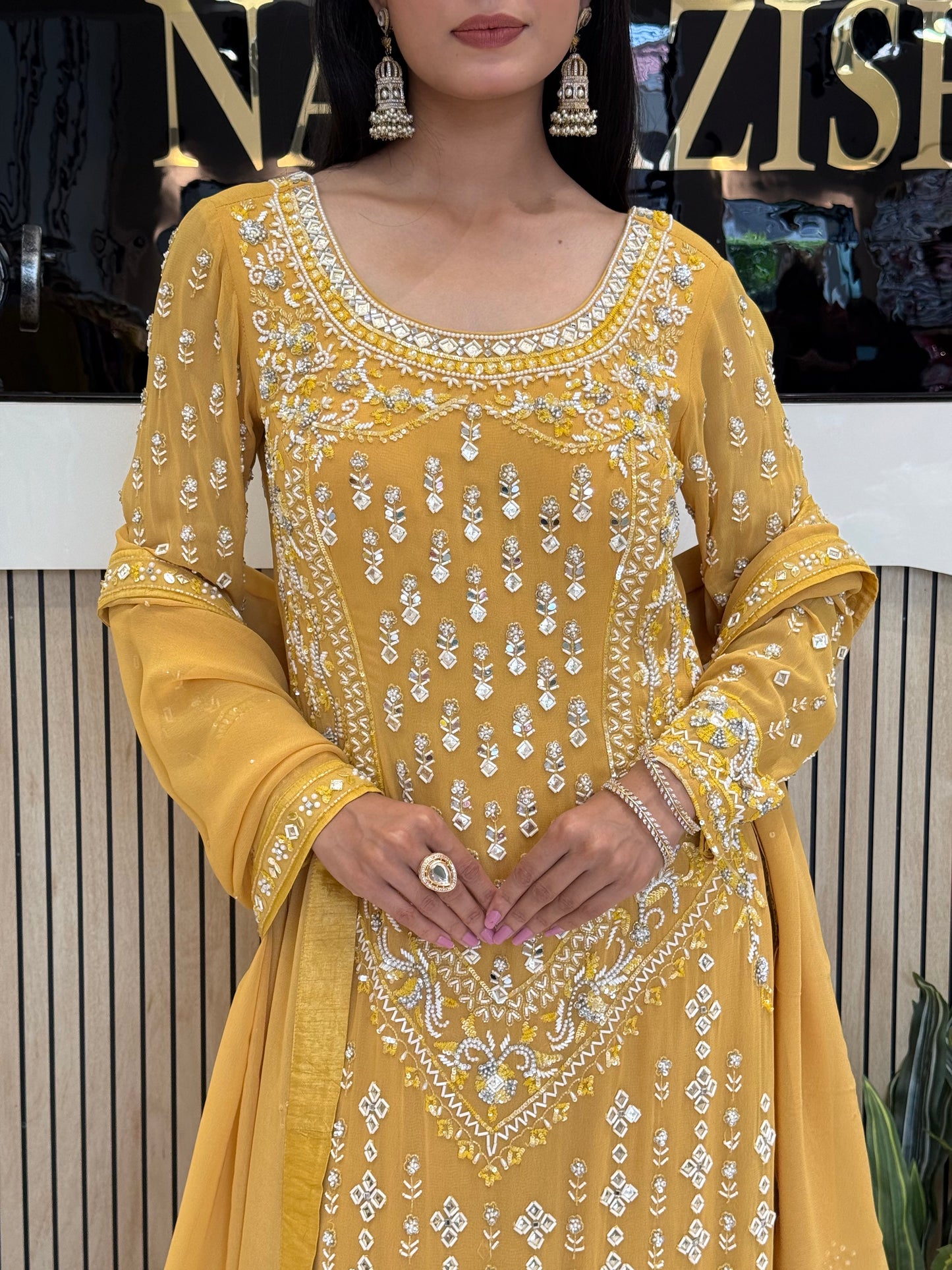Yellow Georgette Garara Suit with Kartdana, Sequins and Mirror Work