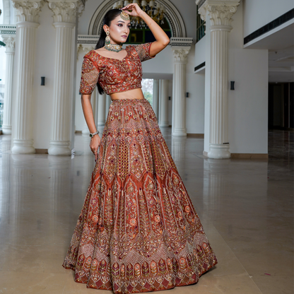Rust Raw Silk Lehenga with Intricate Hand Embroidery